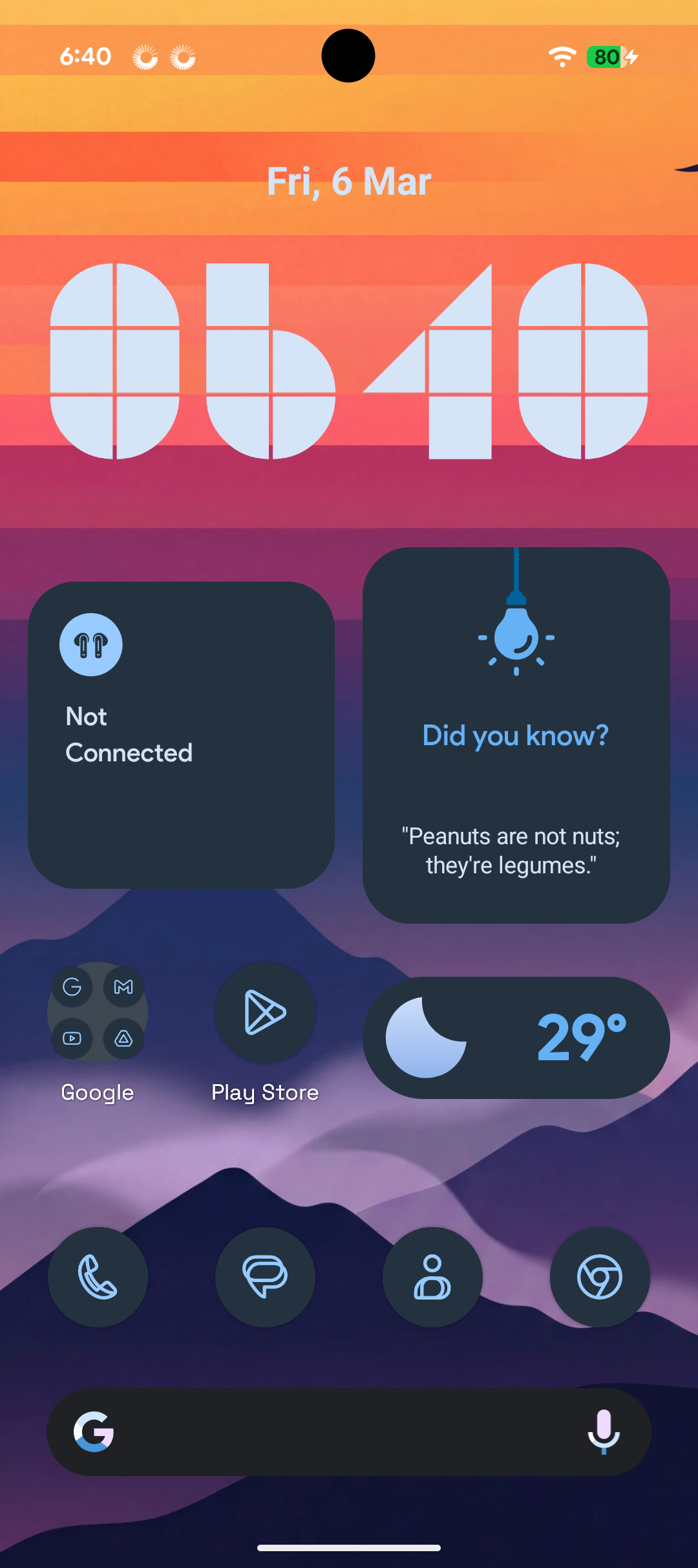 06:40, in a mode: a big clock, two widgets, the weather and four apps on the same wallpaper.